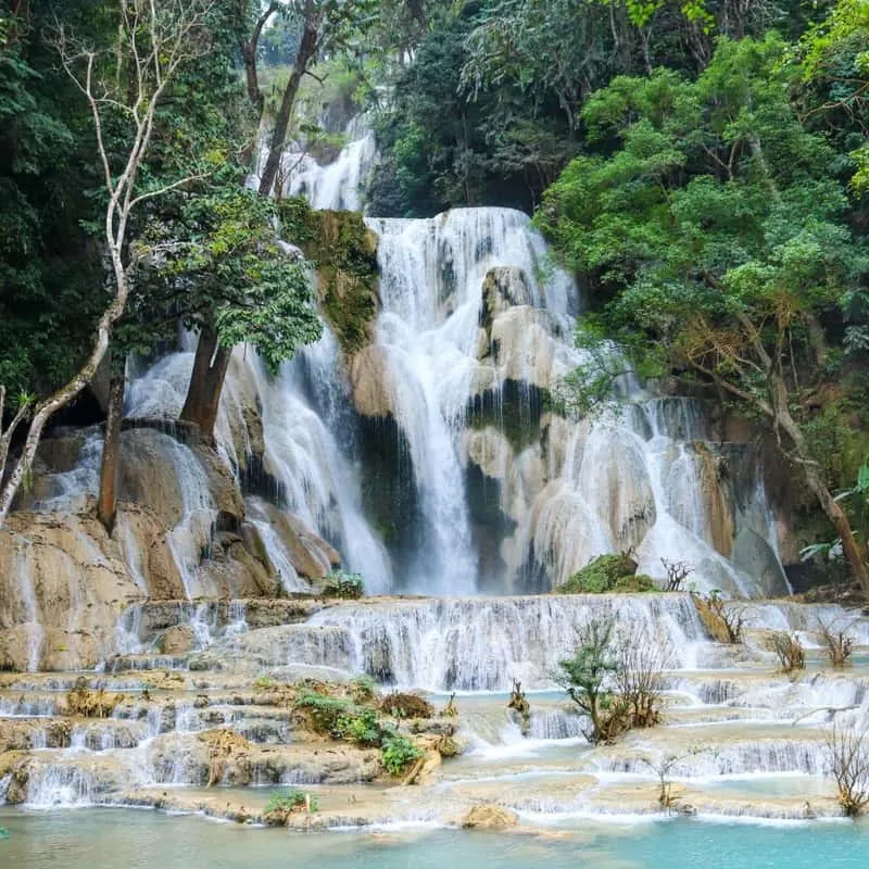 Kuang Si Falls turquoise pools on a Pak Ou Caves day trip, waterfalls in Luang Prabang, Laos